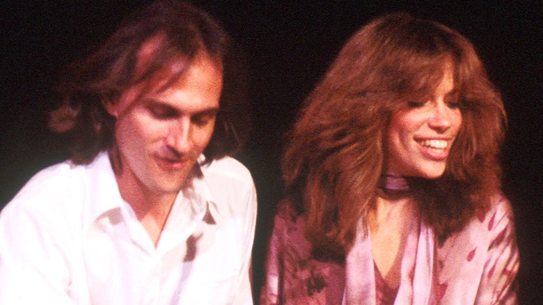 James Taylor and Carly Simon performing