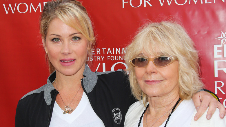 christina applegate embracing nancy priddy at event