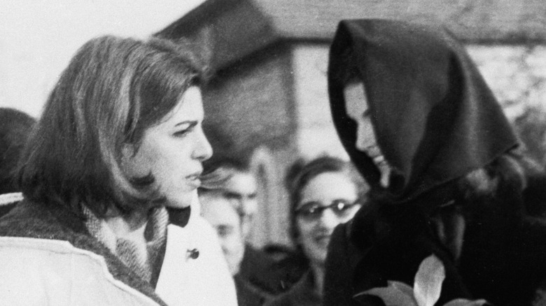 Christina and Jackie Onassis face each other