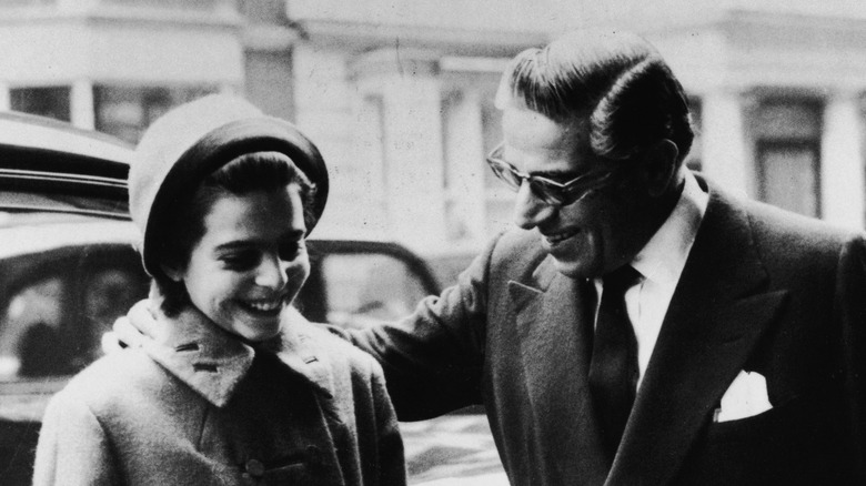 Aristotle Onassis pats Christina's shoulder