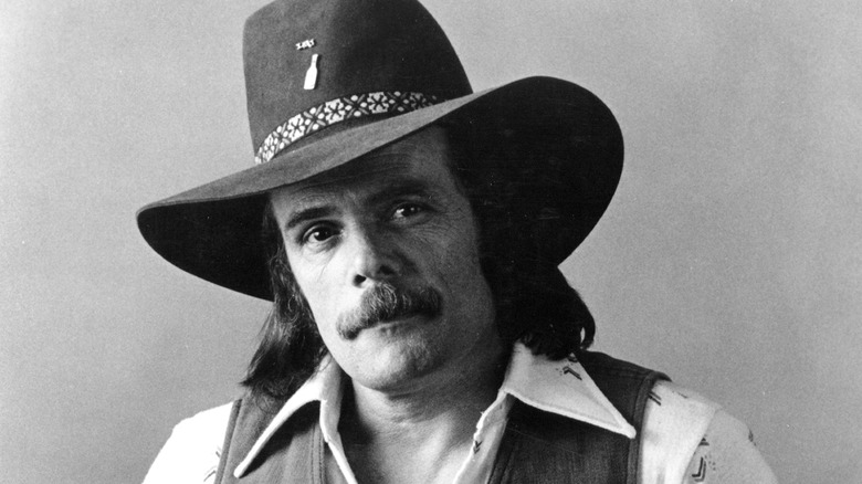 Johnny Paycheck wearing cowboy hat