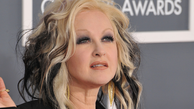 Cyndi Lauper posing at awards ceremony