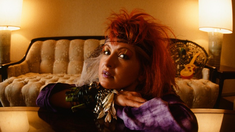 Young Cyndi Lauper selfie in hotel room