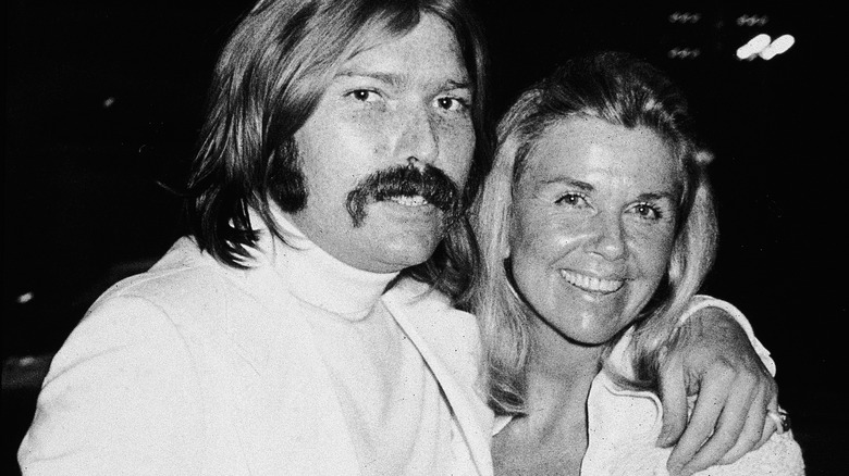 Terry Melcher posing with Doris Day