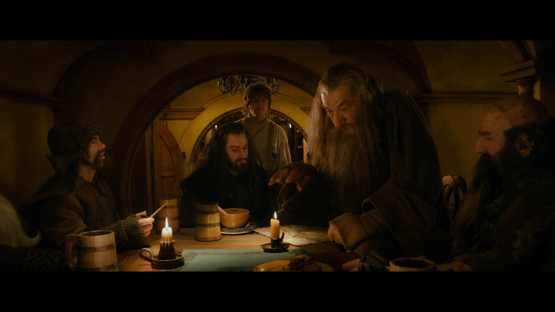Ian McKellen with hobbits