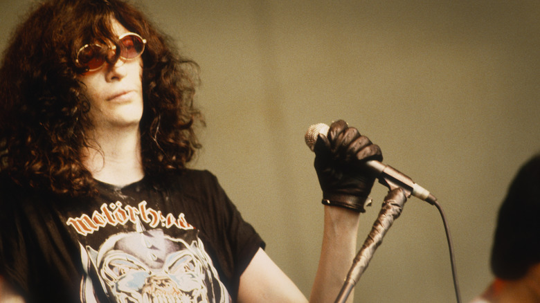 Joey Ramone performing sunglasses leather glove