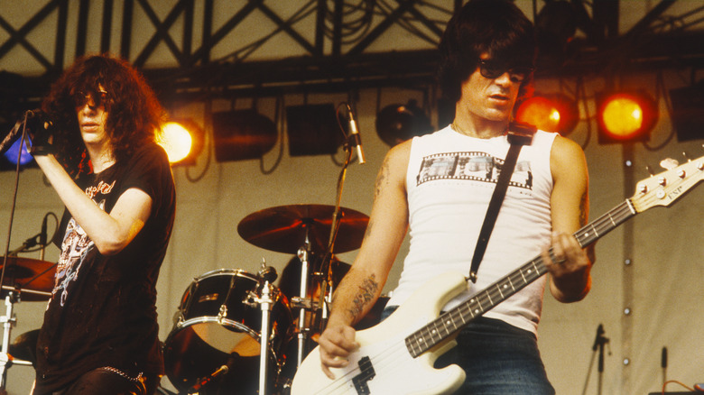 Joey and Dee Dee Ramone performing guitar drums