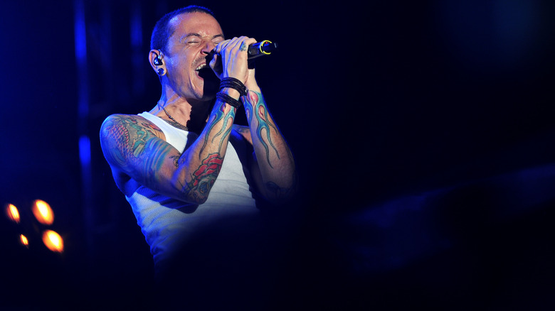 Chester Bennington performing on stage with Linkin Park