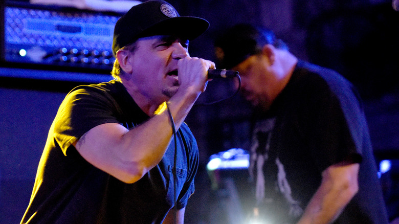 Jim Lindberg performing on stage with Pennywise