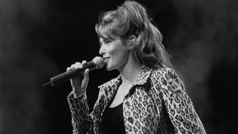 Shania Twain performing on stage black and white