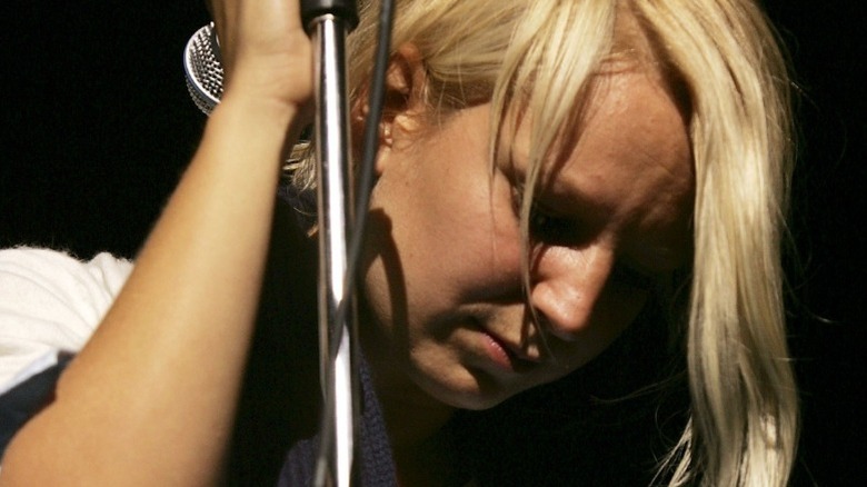 Sia looking down while performing