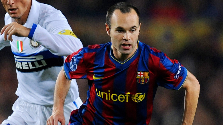 Andrés Iniesta playing football for Barcelona