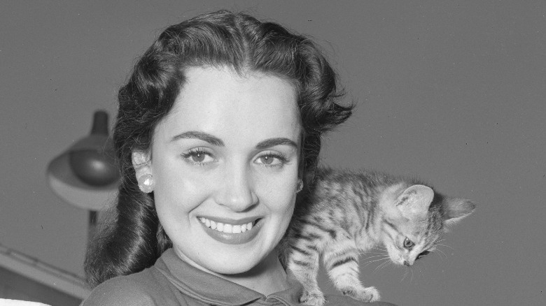 Susan Cabot smiling with cat