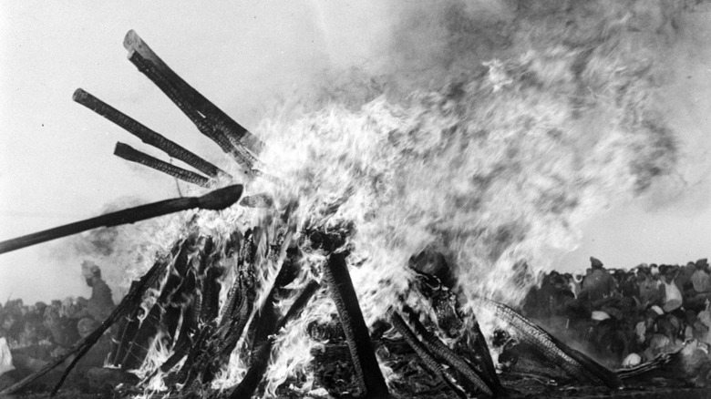 Gandhi's funeral pyre burns