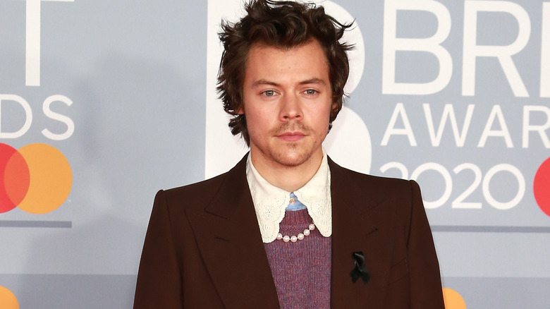 Harry Styles BRIT Awards black lapel ribbon