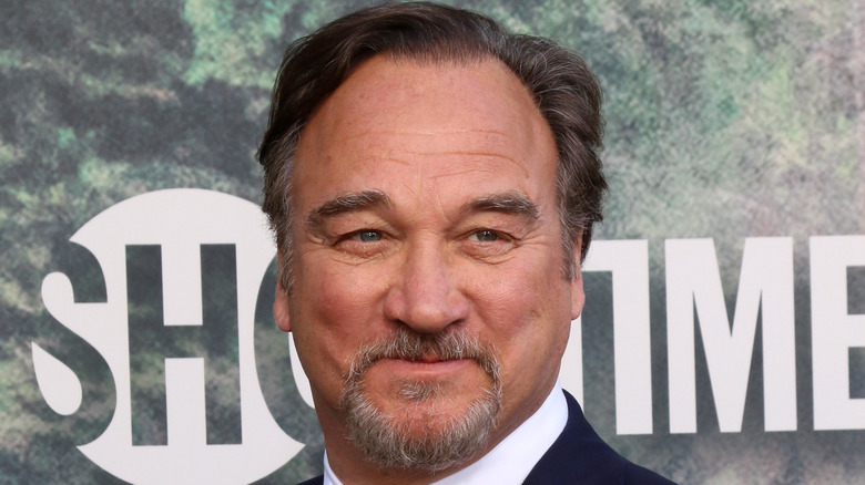 Jim Belushi on red carpet smiling