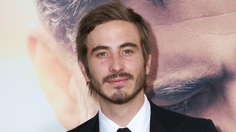 Ryan Corr black suit