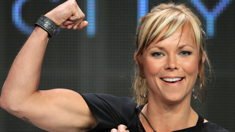 Jessi Combs flexing bicep