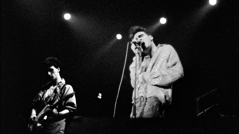 Johnny Marr and Morrissey performing