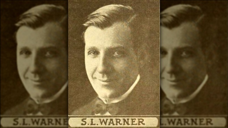 Sam Warner smiles for portrait