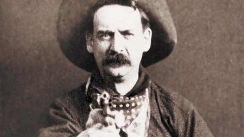 Man with gun in The Great Train Robbery