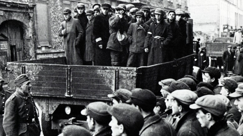 Jews standing on transport truck