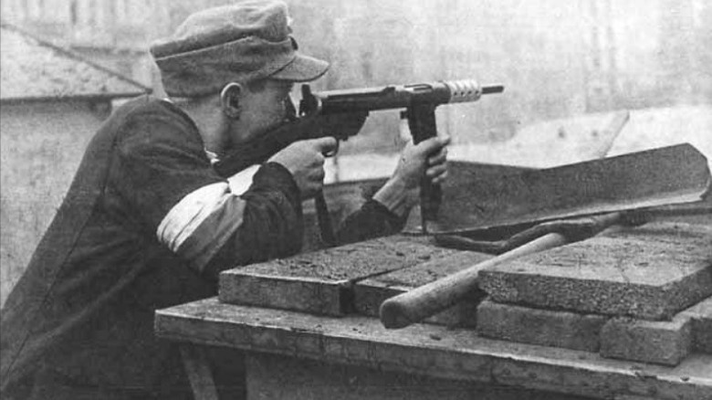 Polish soldier firing gun