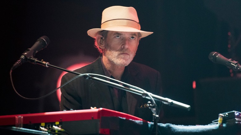 Benmont Tench white hat beard playing keyboards