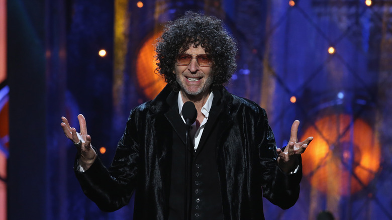 Howard Stern talking in microphone