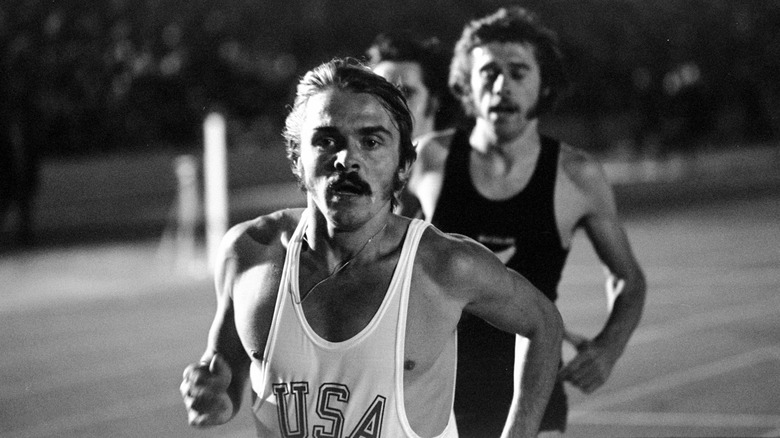 Steve Prefontaine running track with mustache