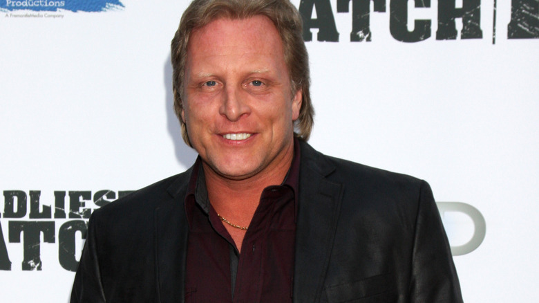 sig hansen smiling black suit jacket at deadliest catch event