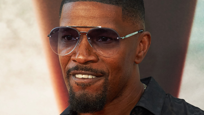 Jamie Foxx wearing sunglasses red carpet