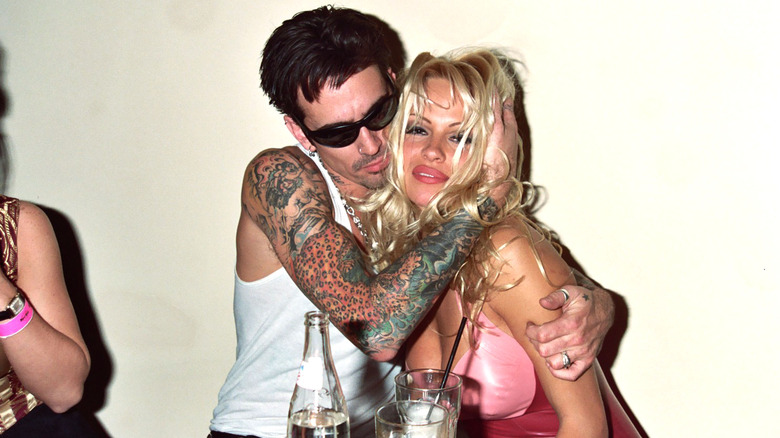 Tommy Lee hugging Pamela Anderson