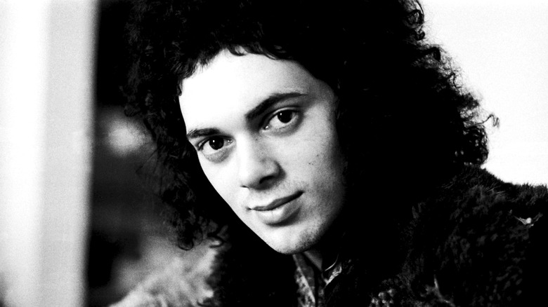 Andy Fraser of Free curly black hair smiling