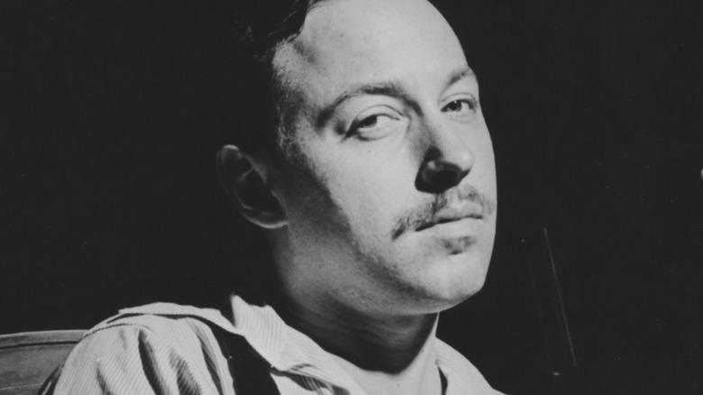 Tennessee Williams looking roguishly at the camera