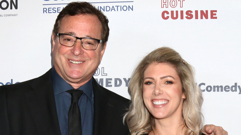 Bob Saget and wife Kelly Rizzo at an event