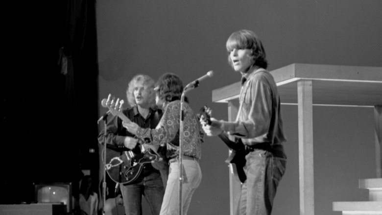 Creedence Clearwater Revival performing on stage