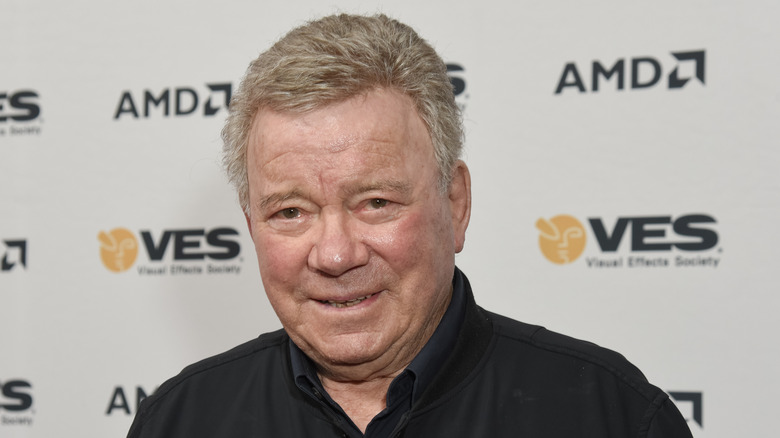 William Shatner smiling black shirt event