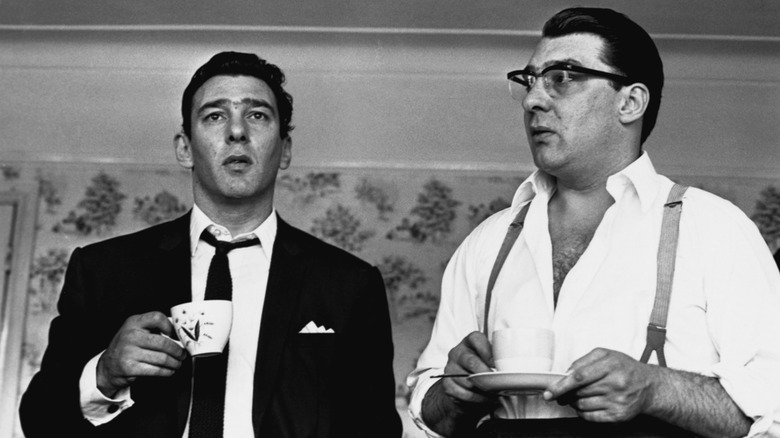 Ronnie and Reggie Kray drinking tea