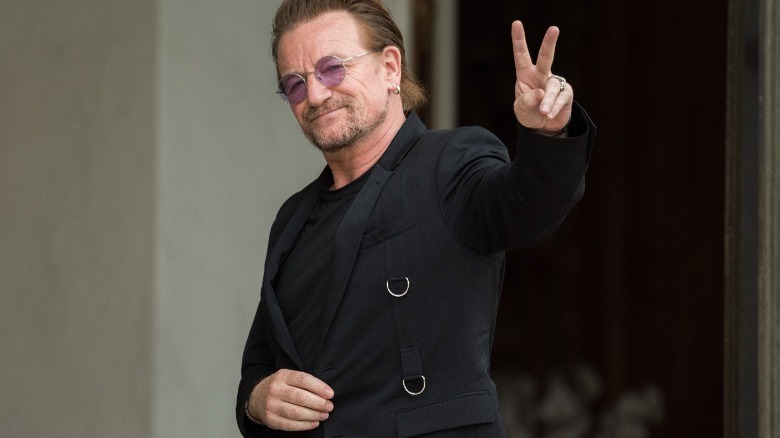 Bono giving peace sign