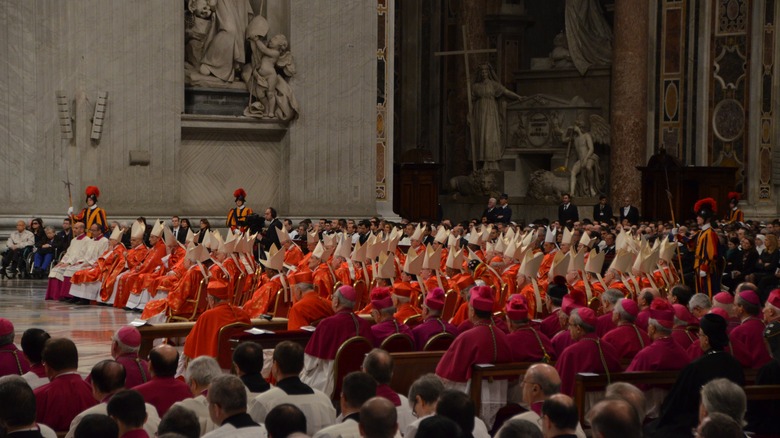 Cardinals sitting in St. Peter's Basilica for mass