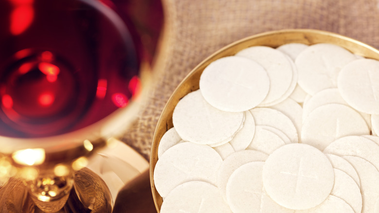 Communion wafers plate wine chalice