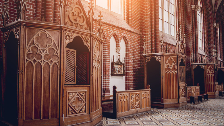 Wooden confessionals in old catholic church