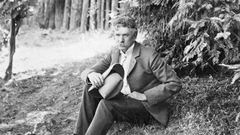 ambrose bierce sitting outside