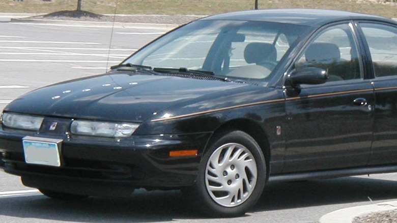 1996-1999 Saturn SL in parking lot