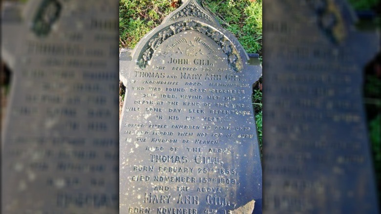 Fallen gravestone of John Gill