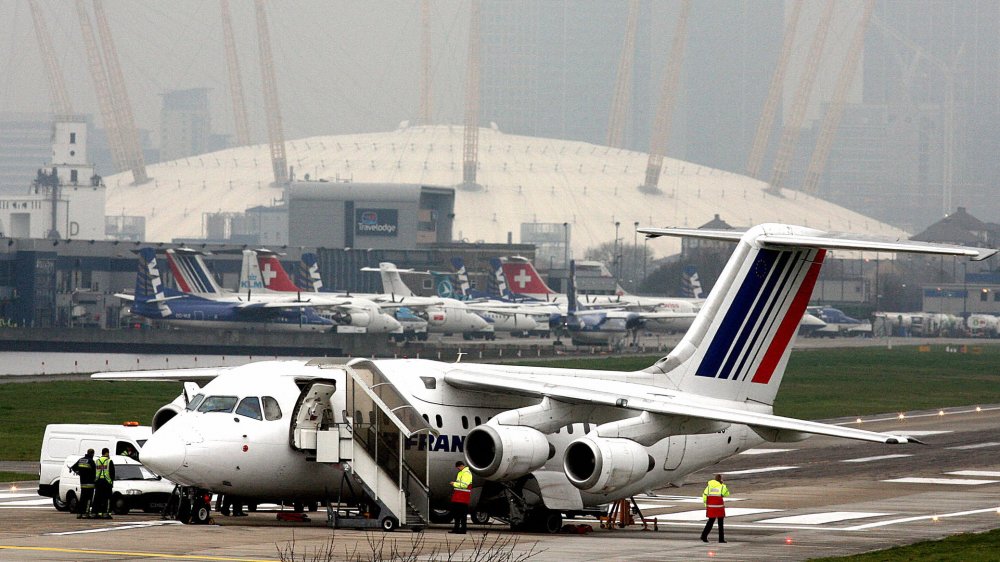 Plane grounded over exploded tire