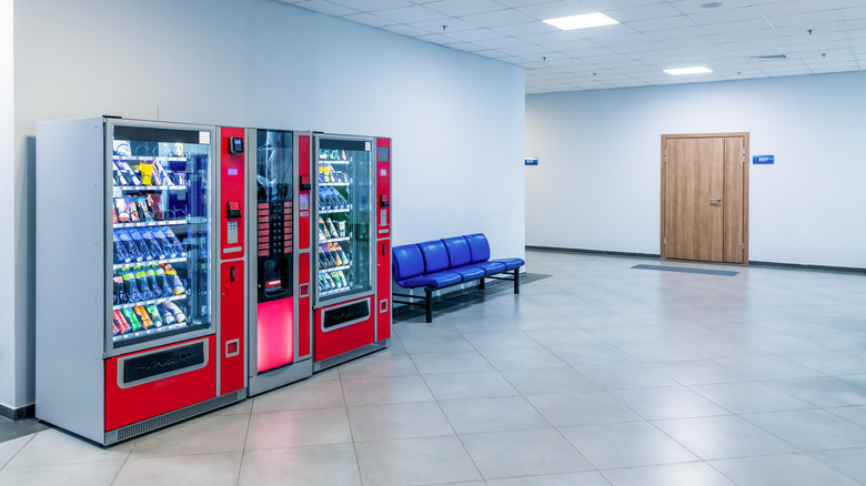 Two vending machines in a corridor