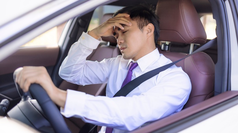 man waiting in traffic