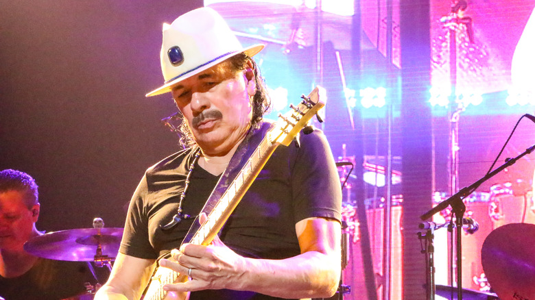 Carlos Santana playing guitar